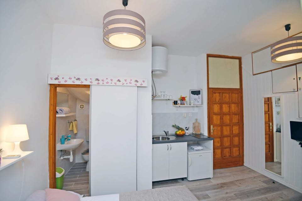 Kitchen or kitchenette, stove