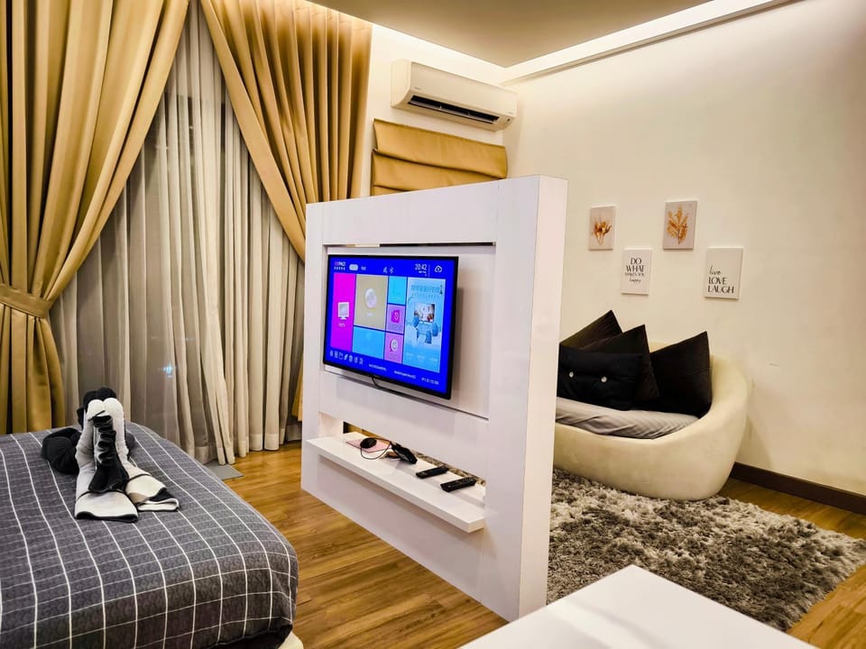 Bed, TV and multimedia, Living room, Seating area, air conditioner