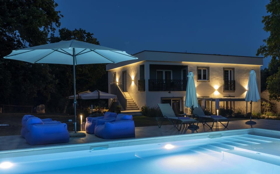 Property building, Patio, Night, Garden, Garden view, Pool view, Swimming pool, sunbed