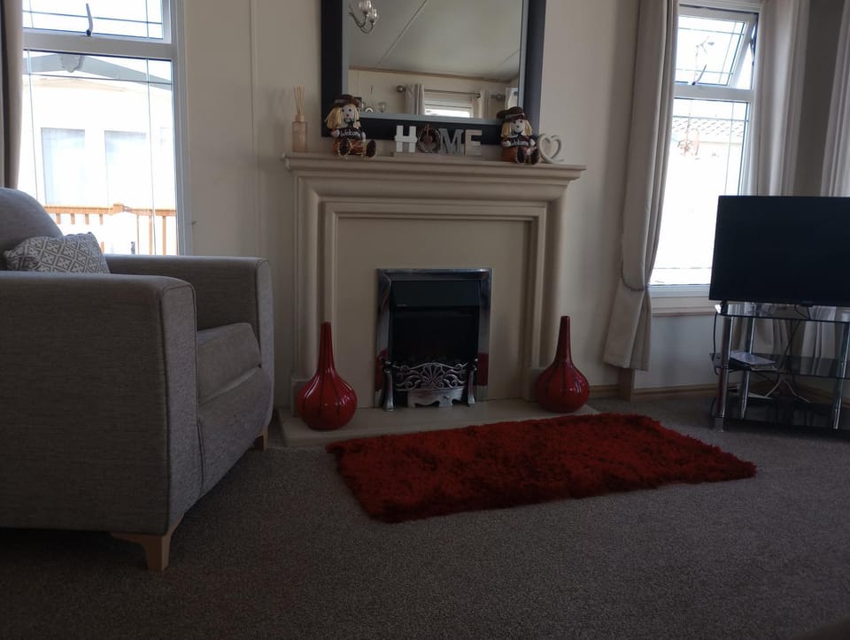 Luxury 2 bedroom caravan with large decking close to beach Free WiFi Campground/ 
RV Resort in Towyn