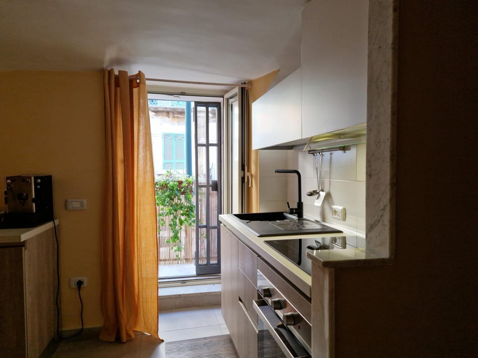 Kitchen or kitchenette, stove