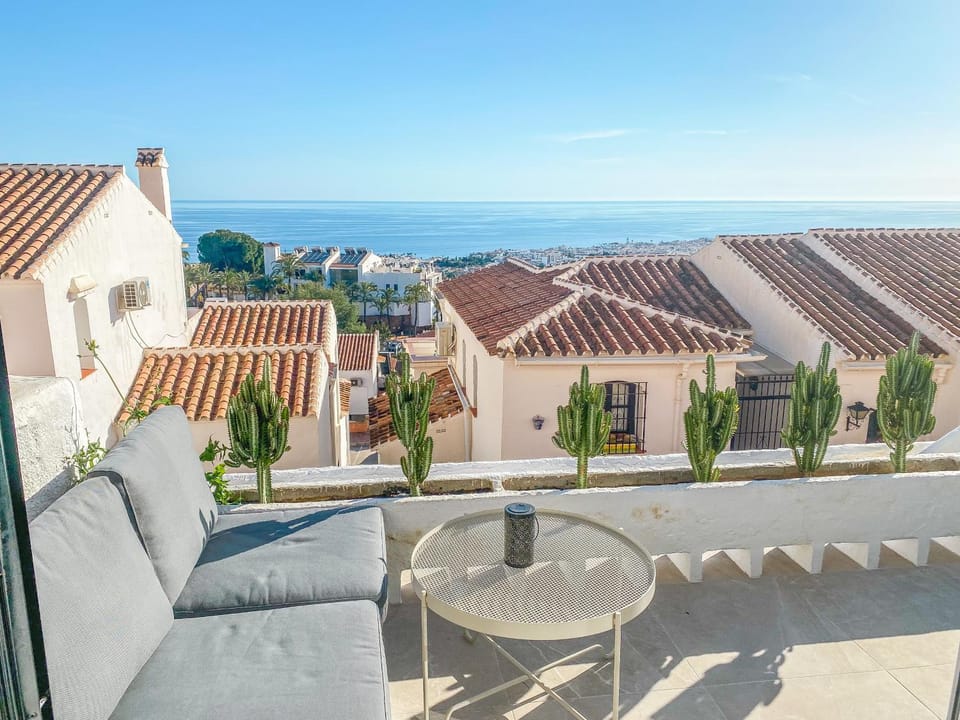 View (from property/room), Balcony/Terrace, Seating area, Sea view