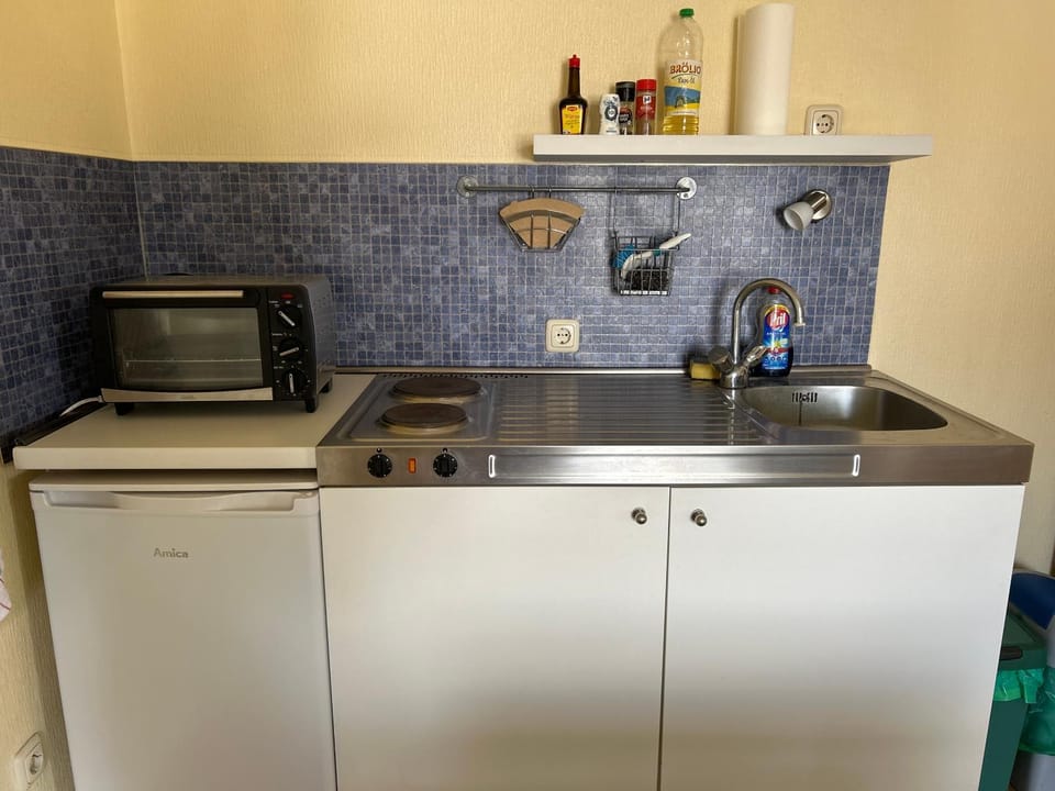 Kitchen or kitchenette, stove