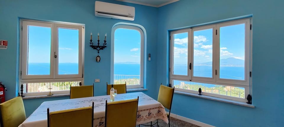 Living room, Seating area, Sea view, air conditioner