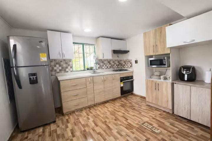 Kitchen or kitchenette, oven