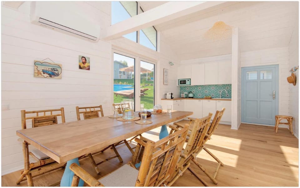 Kitchen or kitchenette, Living room, Seating area, Dining area, Pool view