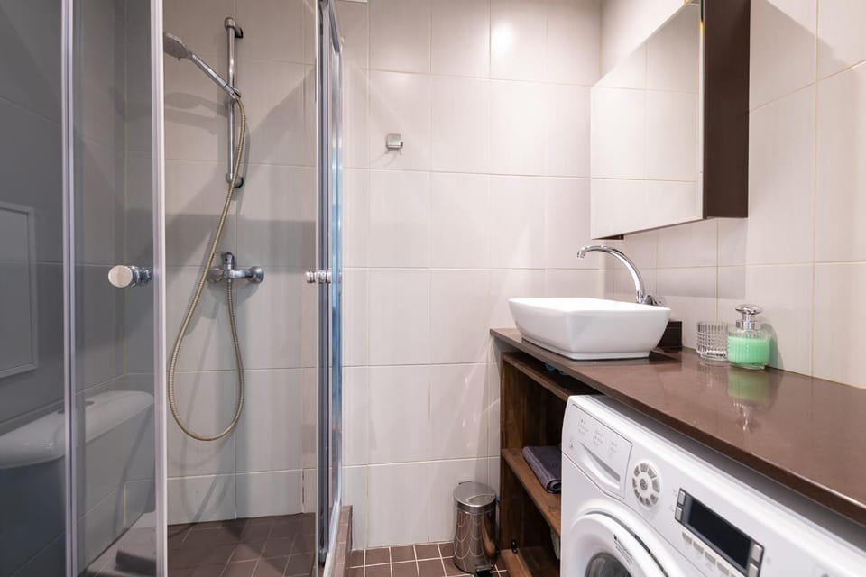 Shower, Bathroom, towels, washing machine, dryer