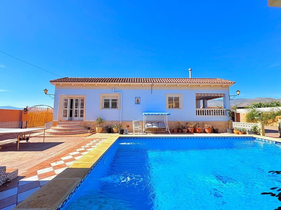 Property building, Living room, Swimming pool