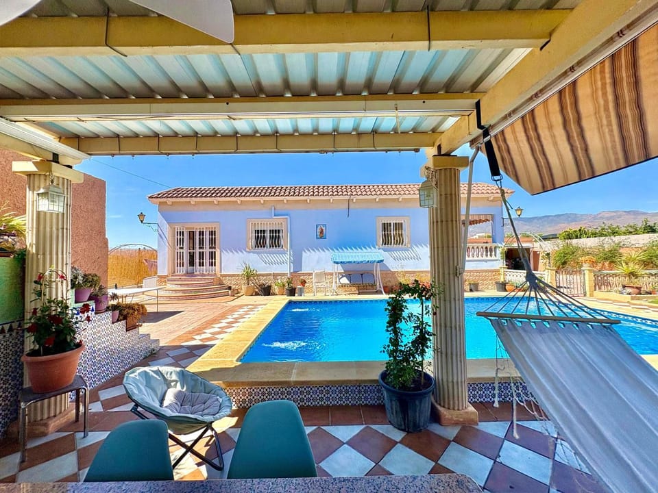 Property building, Living room, Swimming pool