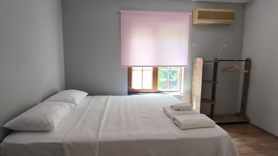 Bed, Photo of the whole room, Bedroom, towels, air conditioner