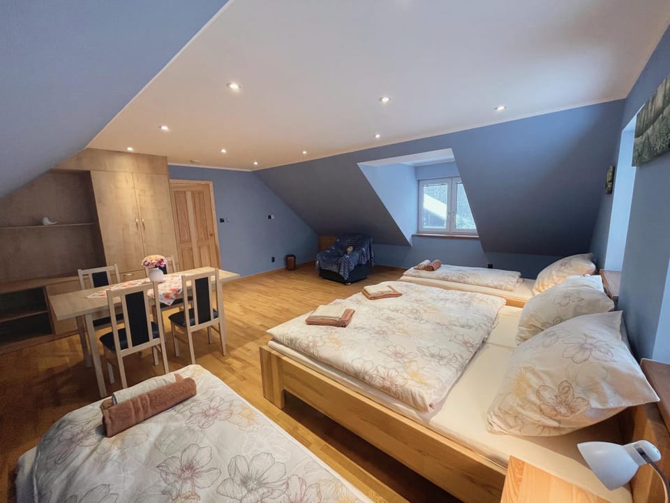 Bed, Living room, Seating area, Bedroom