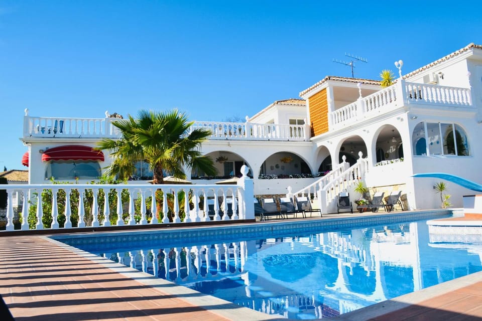 Property building, Living room, Swimming pool