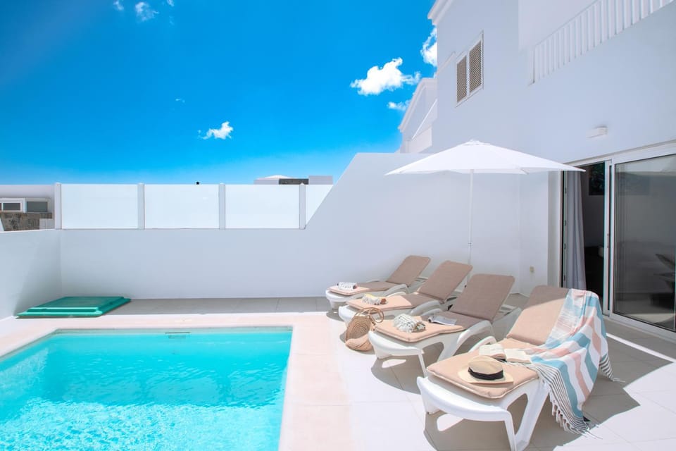 Property building, Living room, Swimming pool