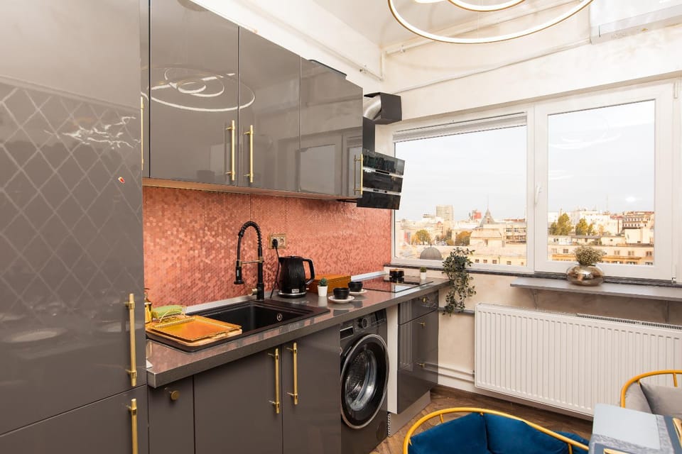 Kitchen or kitchenette, oven, stove, washing machine