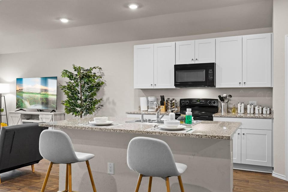 Dining area, minibar, stove, kitchen