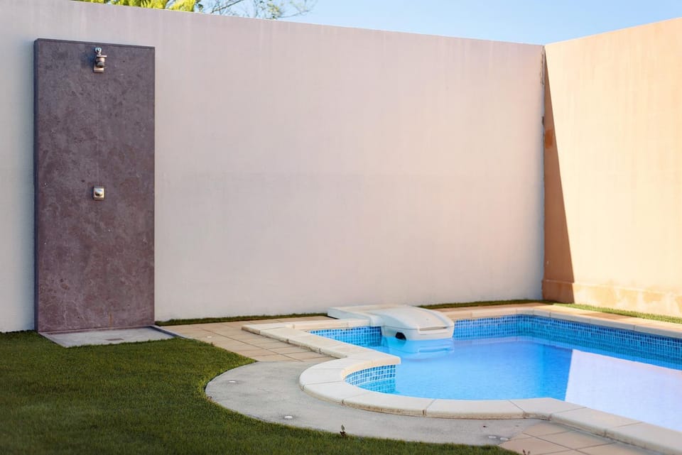 Property building, Living room, Swimming pool