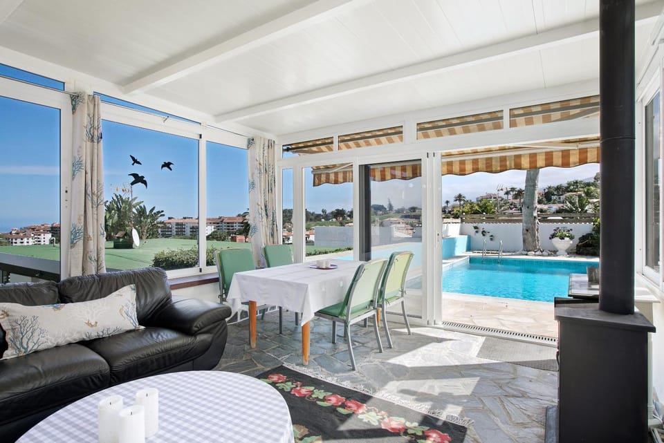 Property building, Living room, Swimming pool
