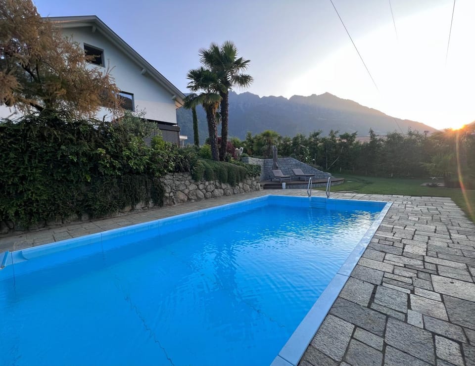 Property building, Living room, Swimming pool