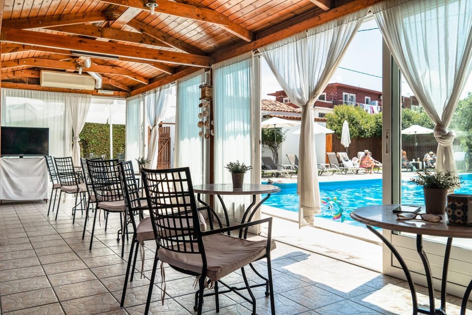 Property building, Living room, Swimming pool