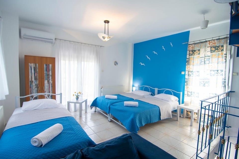 Bed, Photo of the whole room, Bedroom, towels, air conditioner