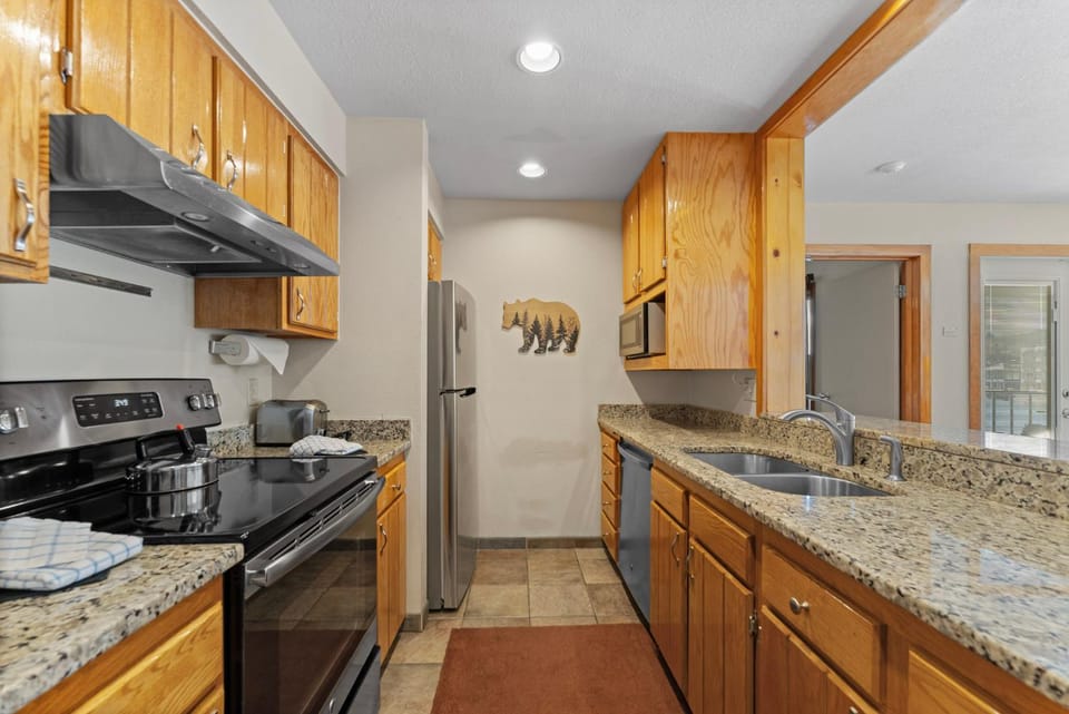Kitchen or kitchenette, furniture, microwave, oven, kitchen