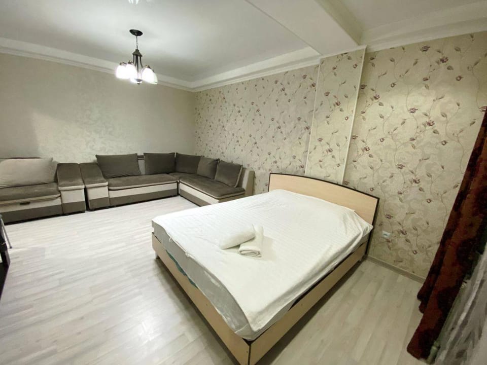 Bed, Living room, Seating area, Bedroom, towels