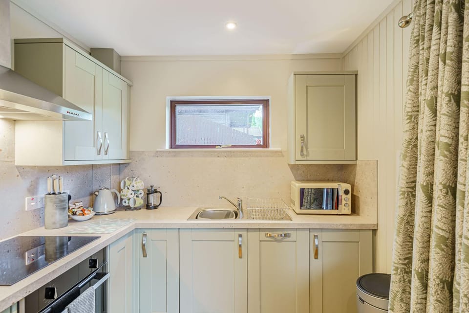 Kitchen or kitchenette, stove, toaster