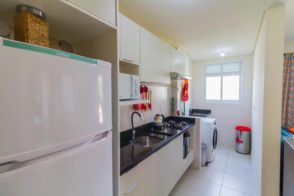 Kitchen or kitchenette, minibar, stove