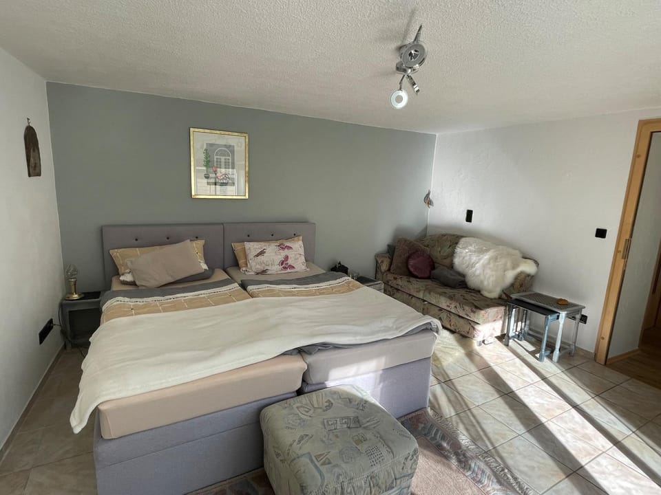 Bed, Seating area, Bedroom