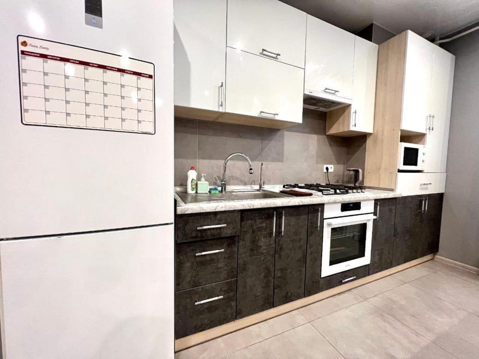 ApartPoltava Світла СТУДІЯ в НОВОМУ комфортному будинку, БІЛА АЛЬТАНКА Готельний чек Apartment in Ukraine