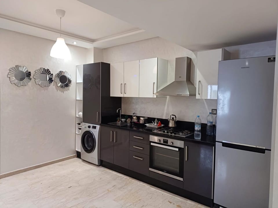 Kitchen or kitchenette, stove, stove, washing machine