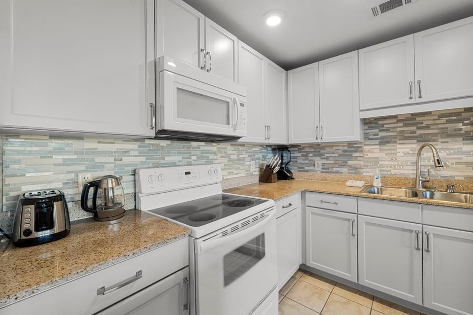 Lovely Resort Low Floor Condo! Just Steps to the Beach & Restaurants! by Dolce Vita Getaways PCB Apartment in Panama City Beach