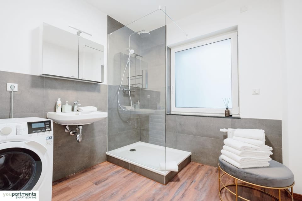 Shower, Bathroom, towels, washing machine, dryer