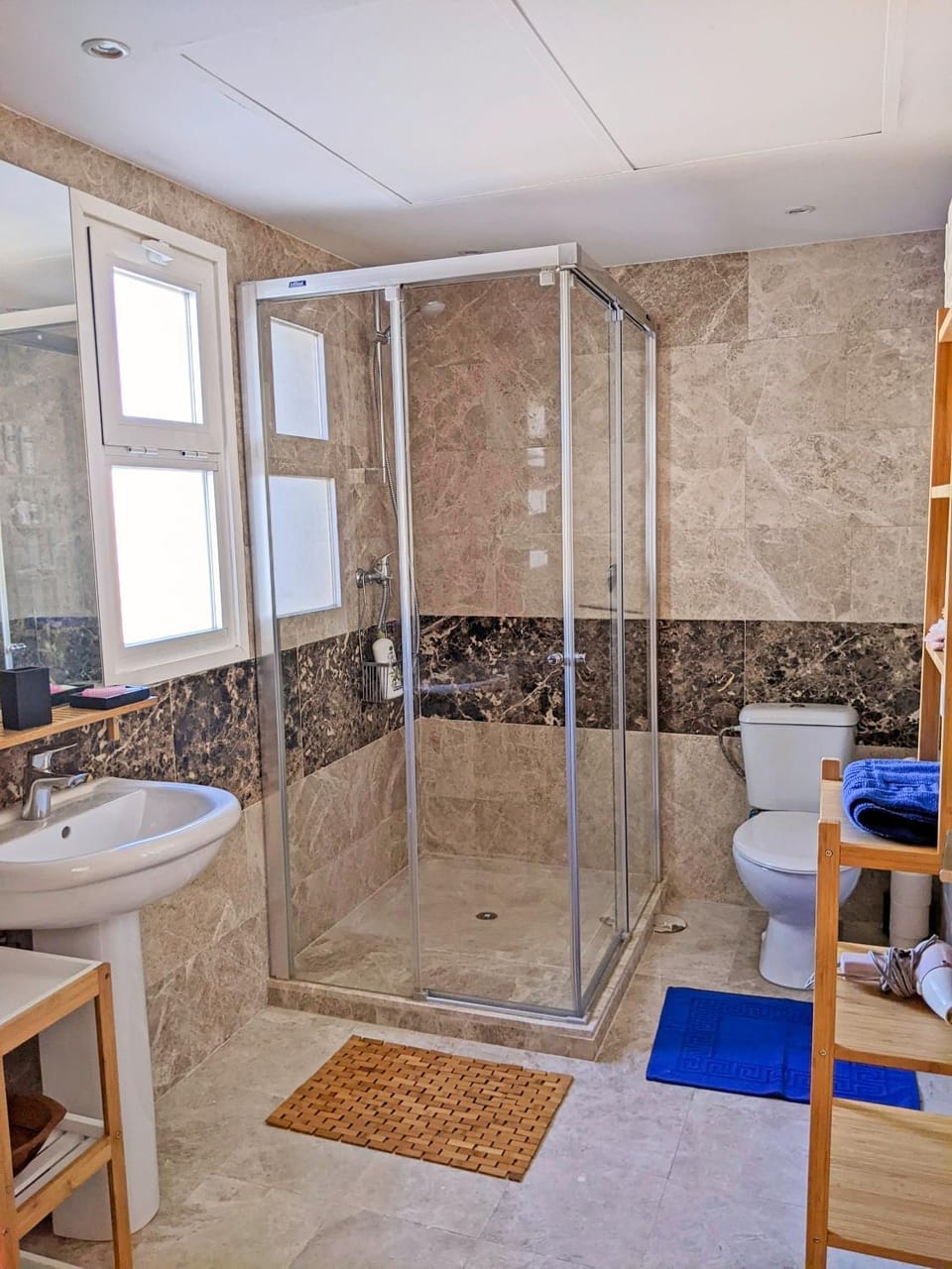 Shower, Toilet, Bathroom, hair dryier, towels