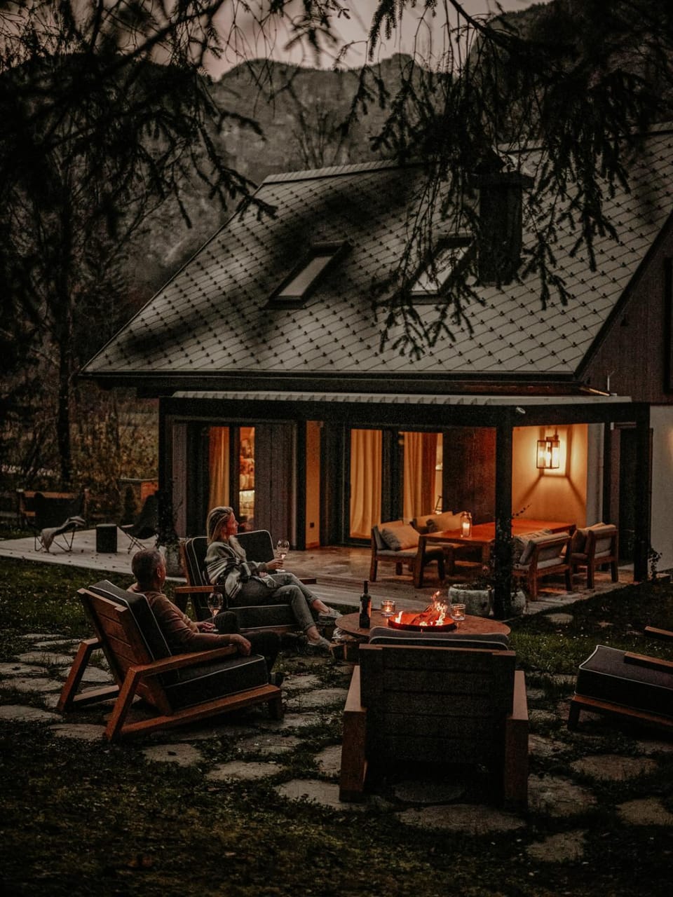 Property building, Patio, Night, Natural landscape, Garden, Seating area, Garden view, sunbed