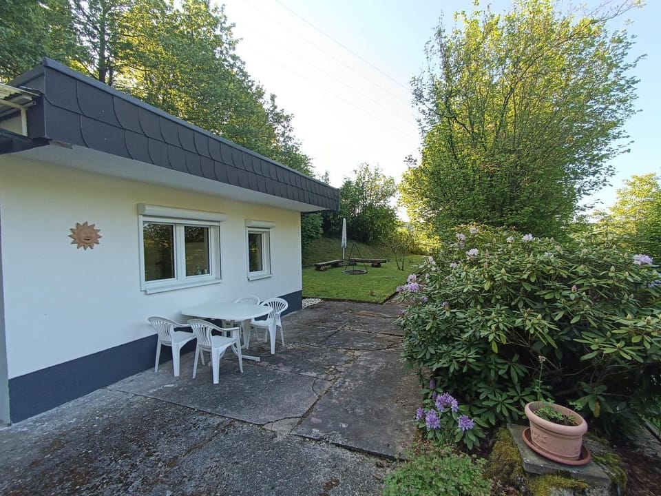 Property building, BBQ facilities, Seating area