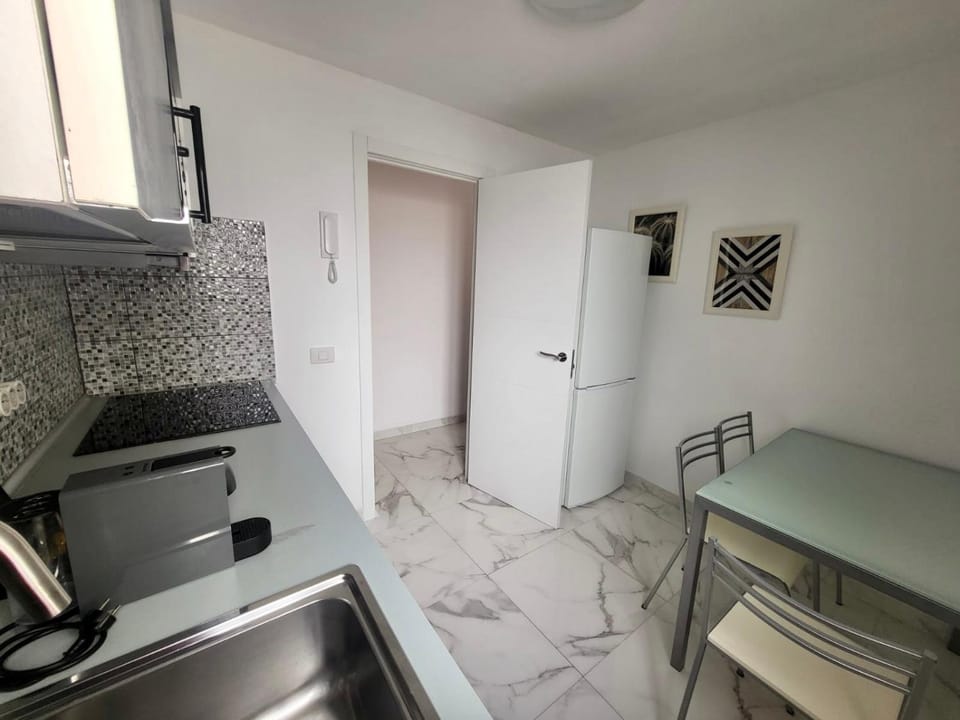 Kitchen or kitchenette, microwave, oven, stove, toaster