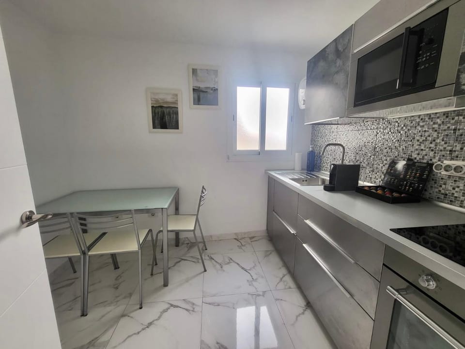 Kitchen or kitchenette, oven, stove, toaster