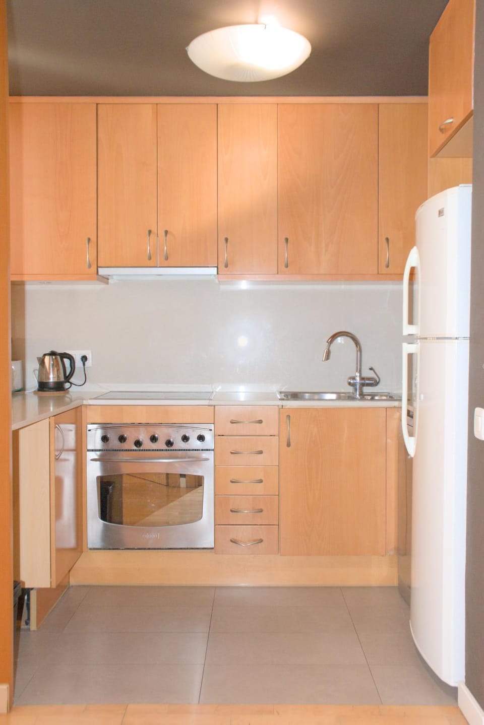 Kitchen or kitchenette, oven, stove