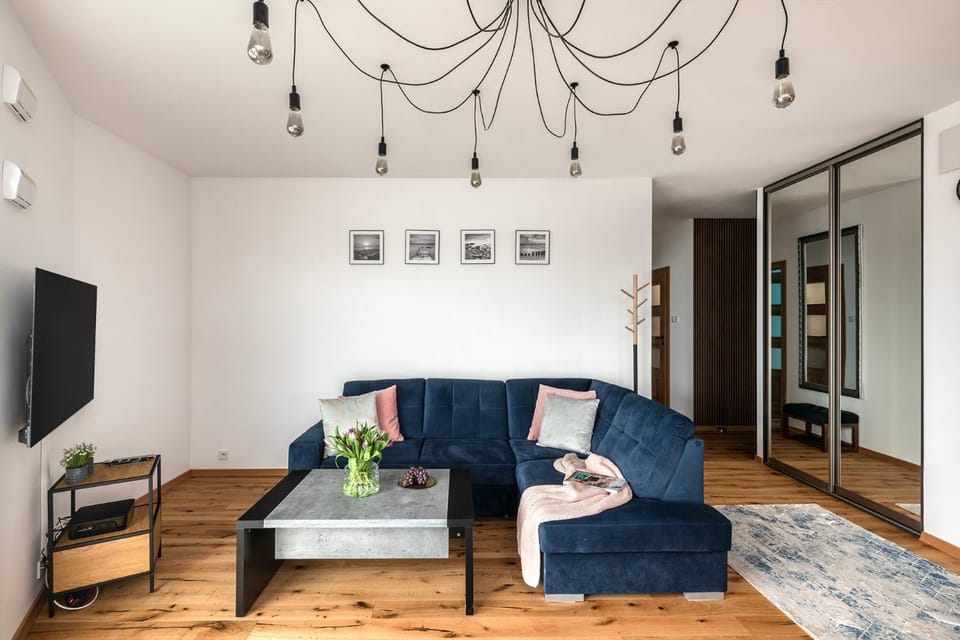 Bed, TV and multimedia, Living room, Seating area, wardrobe