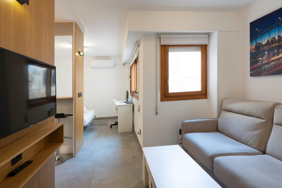 Communal lounge/ TV room, Bed, TV and multimedia, Living room, Photo of the whole room, Seating area, Bedroom, hair dresser, air conditioner