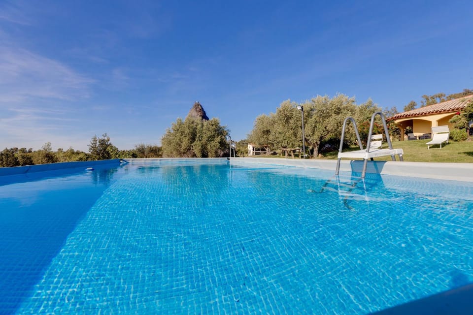 Property building, Living room, Swimming pool