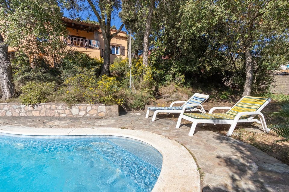 Property building, Living room, Swimming pool