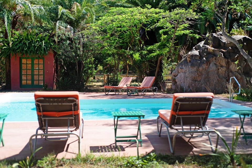 Property building, Living room, Swimming pool