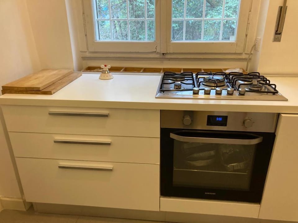 Kitchen or kitchenette, stove