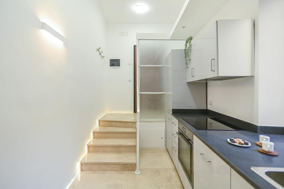 Facade/entrance, kitchen