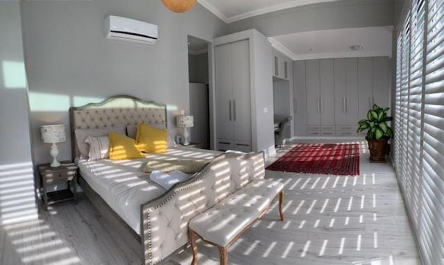 Bed, Living room, Seating area, Bedroom, air conditioner