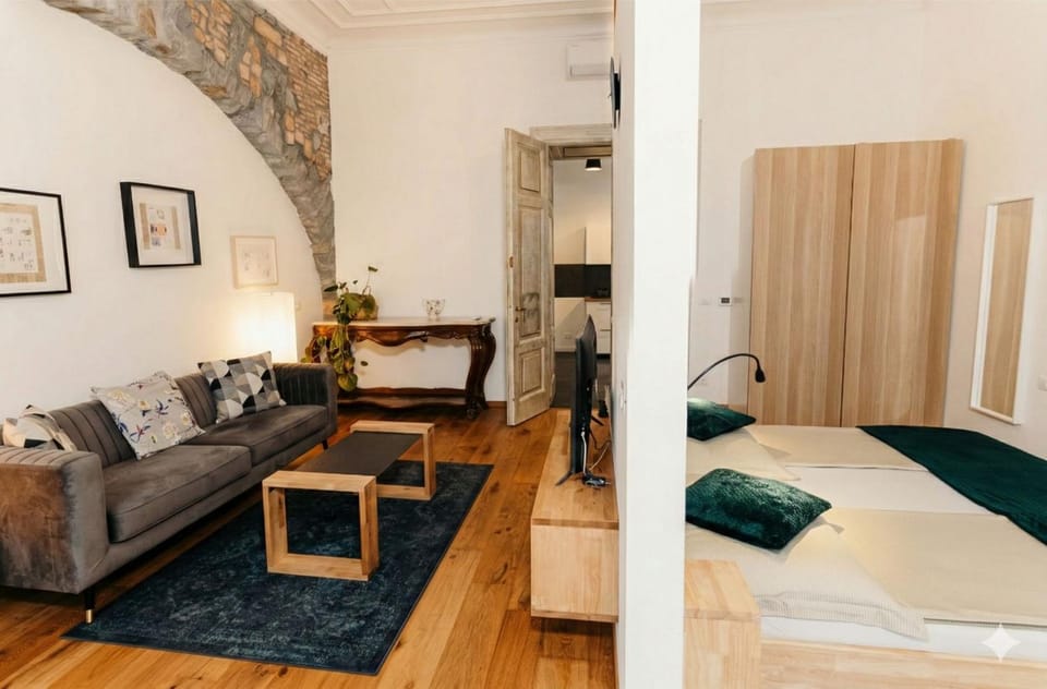 Bed, Living room, Seating area, Bedroom