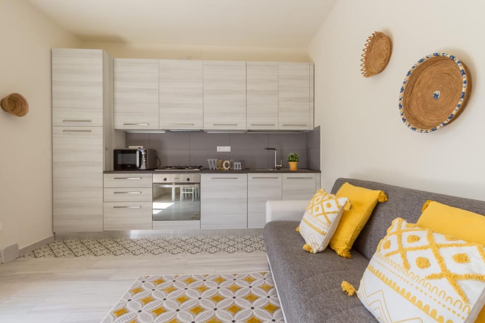 Kitchen or kitchenette, Living room, stove