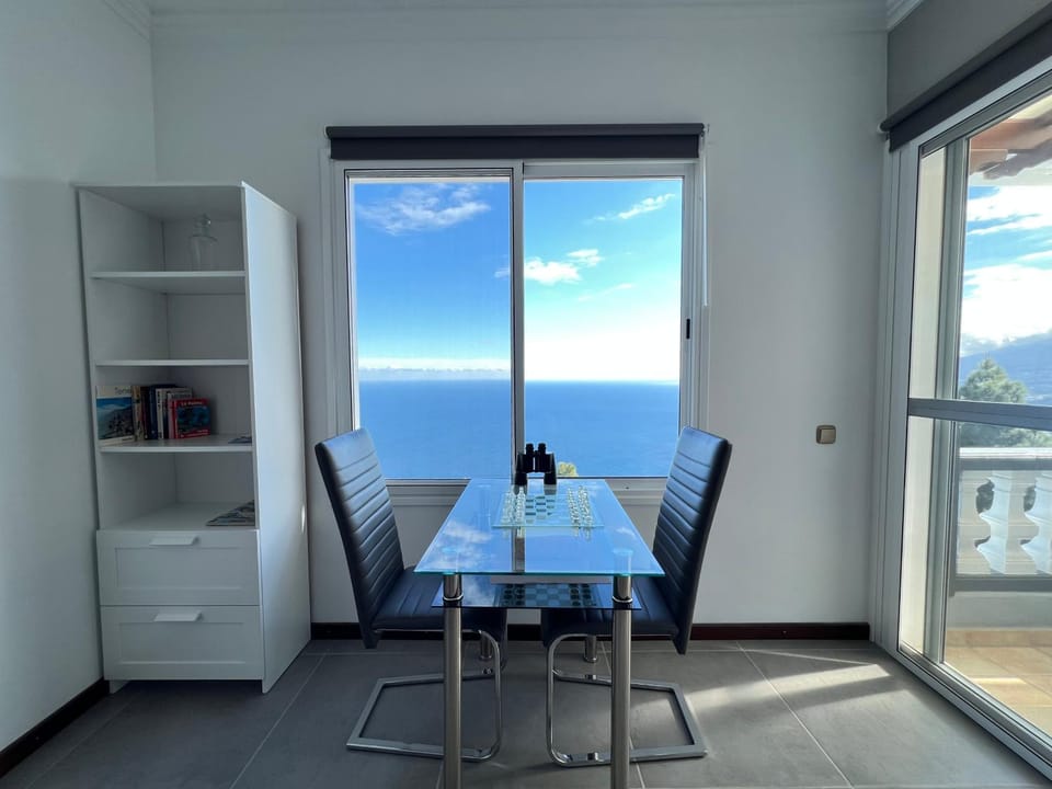 View (from property/room), Living room, Seating area, Dining area